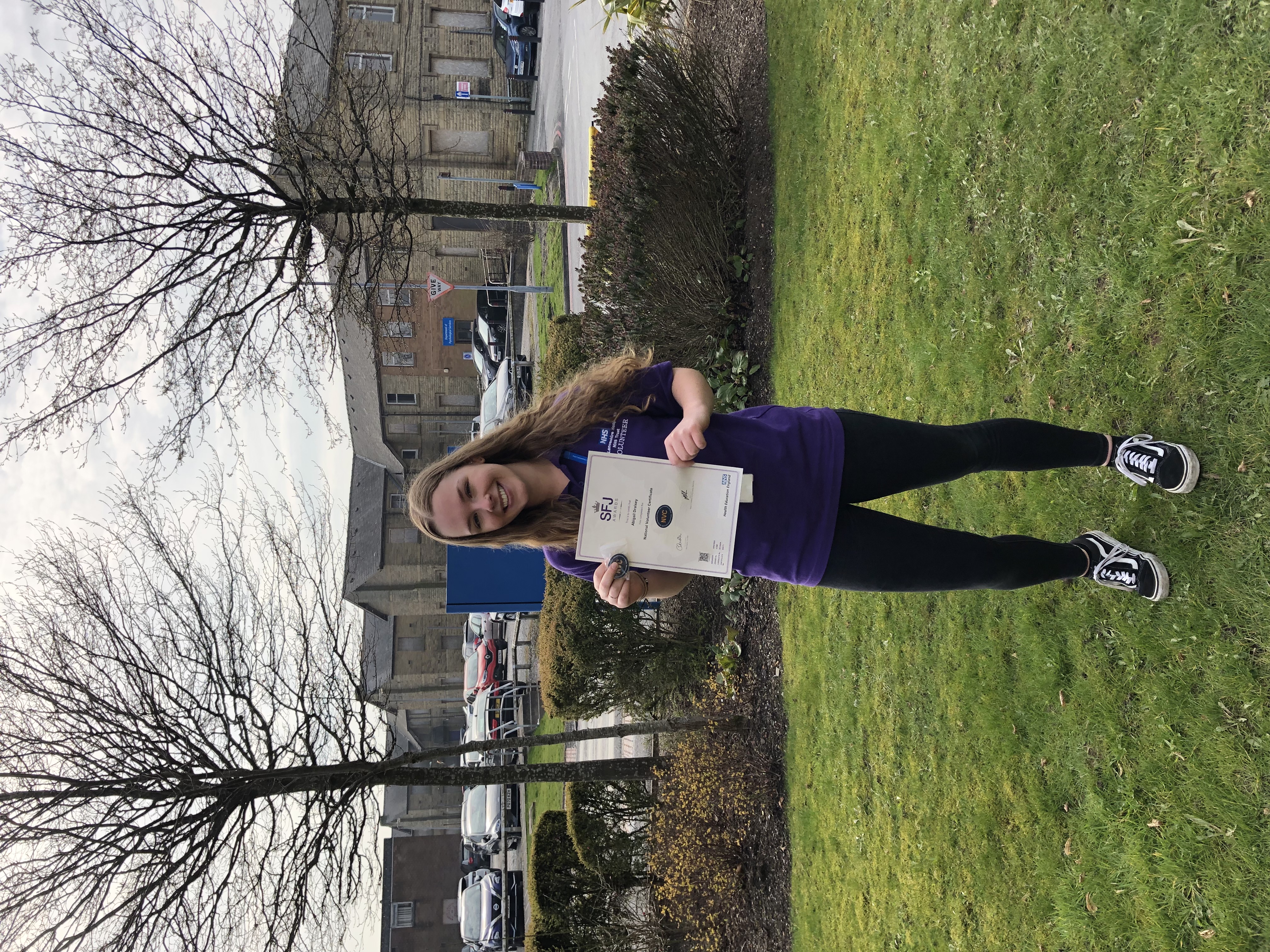 Abbie Draisey with Her National Volunteer Certificate.JPG